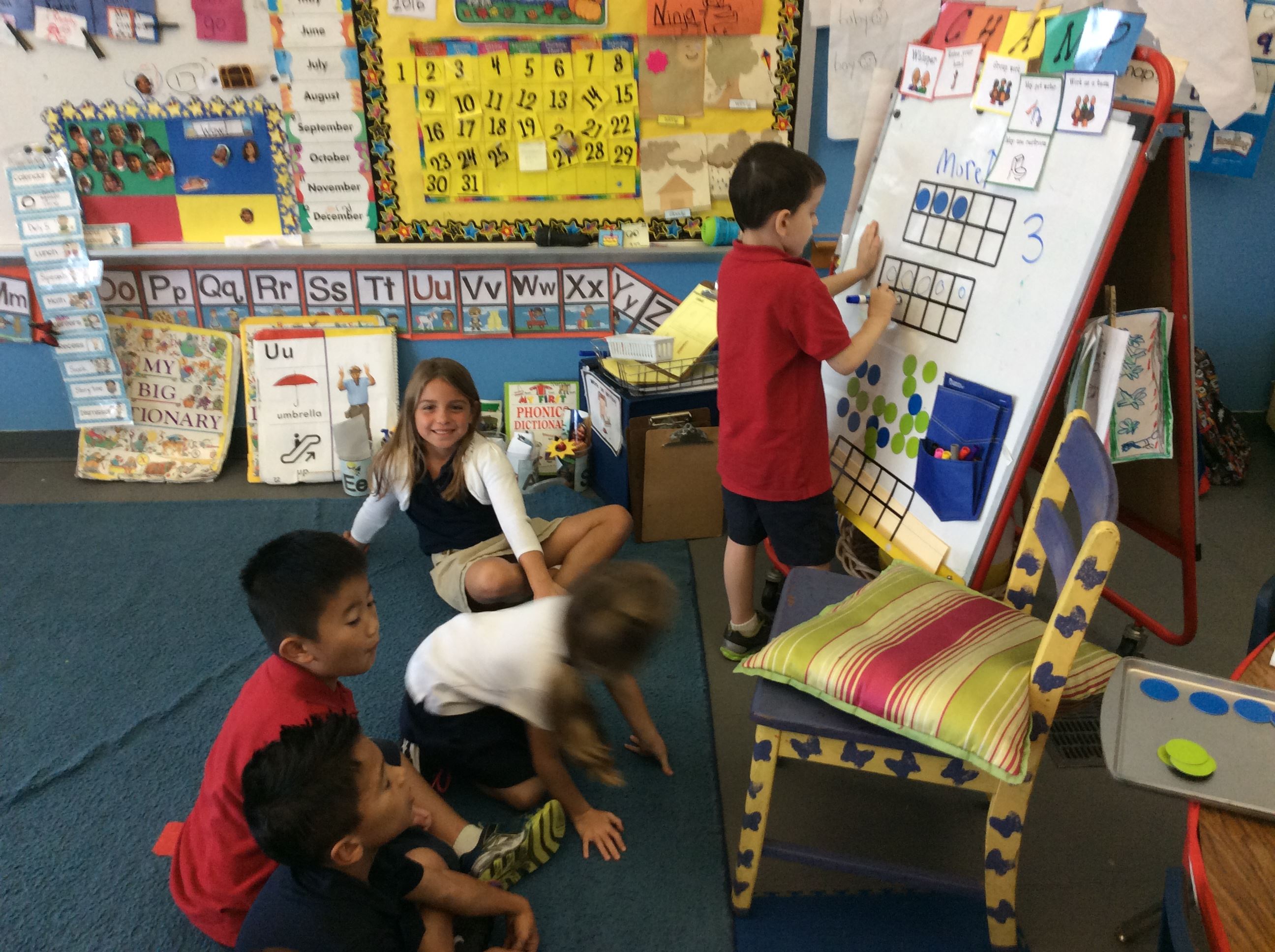Group of students working on a Math activity.  
