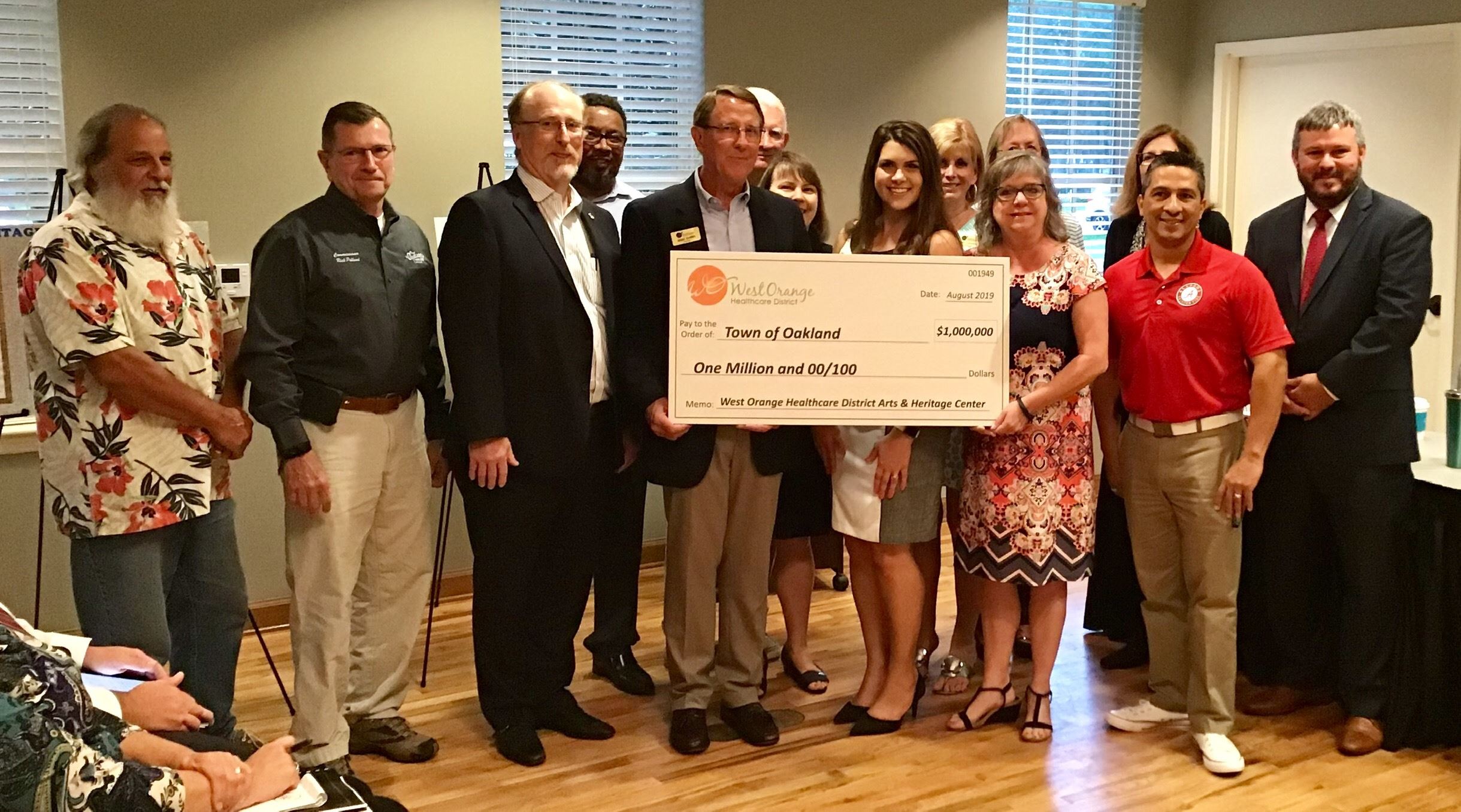 West Orange Health Care District representatives with Town of Oakland Representatives at check prese